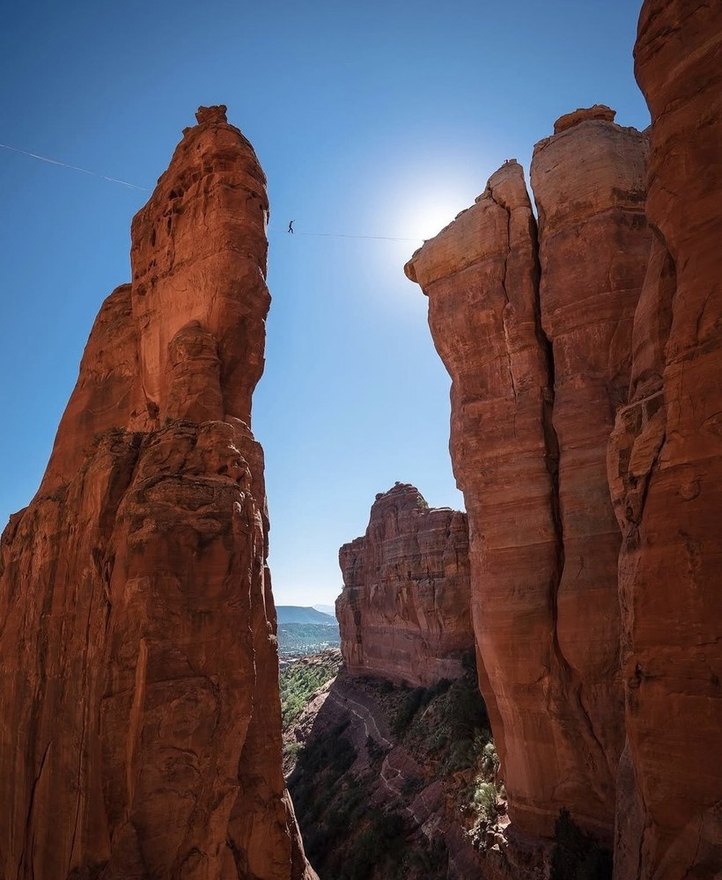 Highlining between towering red rock spires