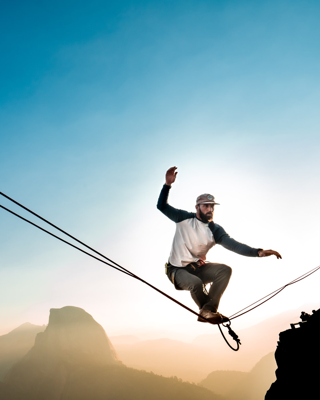 Ryan Robinson — highline, arm raised